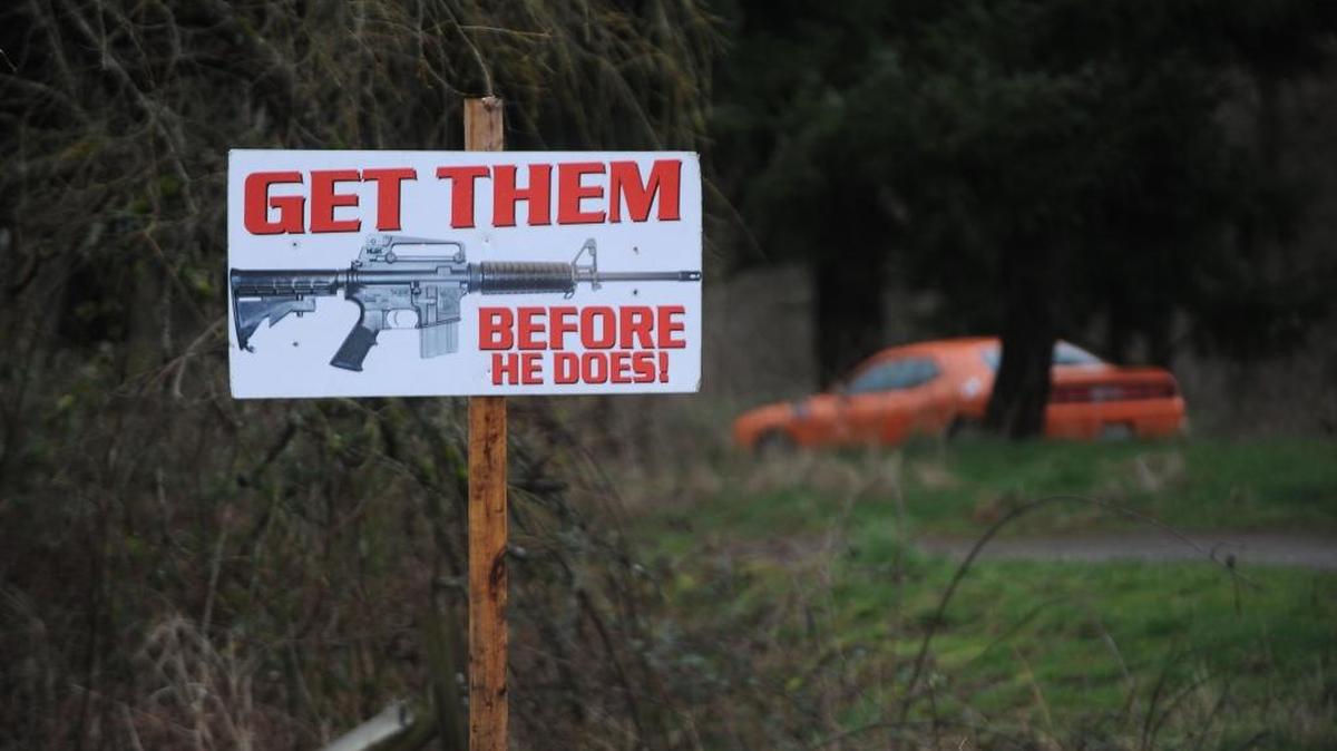 
A sign on Portal Way south of Blaine in 2013 warned people to buy assault rifles before they might be banned.
