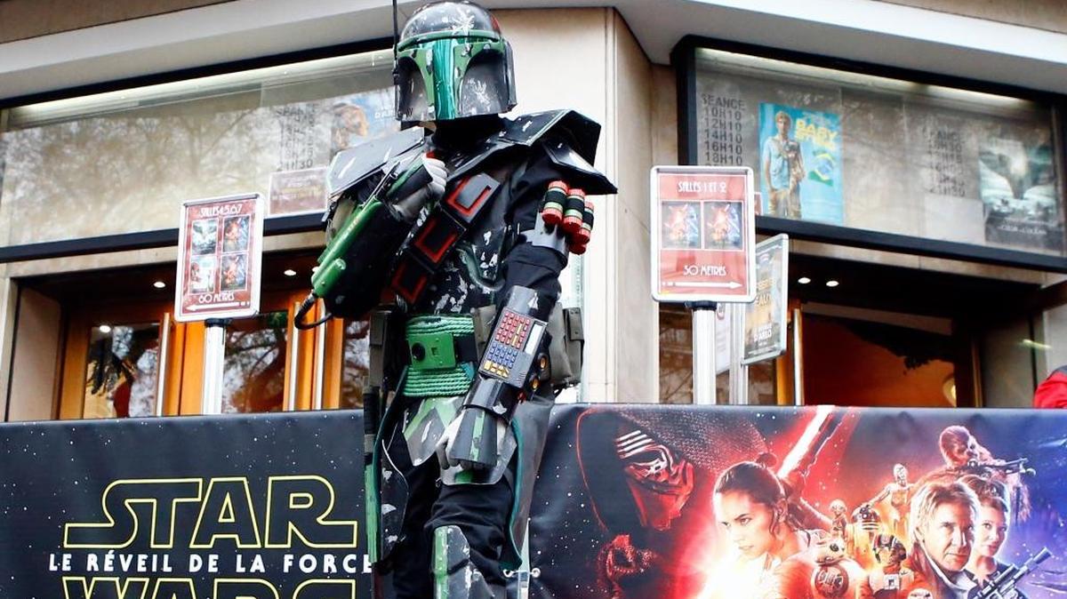 A fan dressed in costume waits for the morning screening of “Star Wars: The Force Awakens” at the Grand Rex cinema in Paris, France, Wednesday, Dec.16, 2015. Regal Entertainment will not allow masks, props, face paint or weapons at its Bellingham screenings of the much-anticipated film.