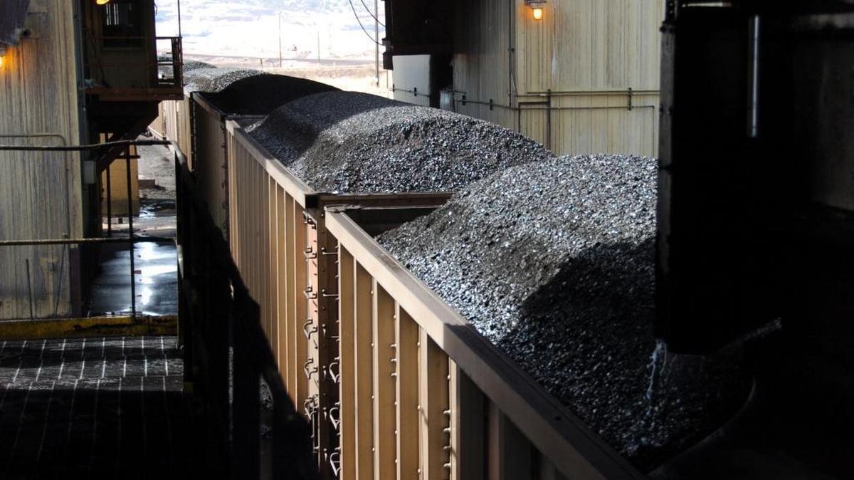 FILE - In this April 4, 2013 file photo, coal is loaded onto hopper cars at Cloud Peak Energy’s Spring Creek Mine near Decker, Mont. Cloud Peak has a stake in the proposed Gateway Pacific coal terminal at Cherry Point in Whatcom County.