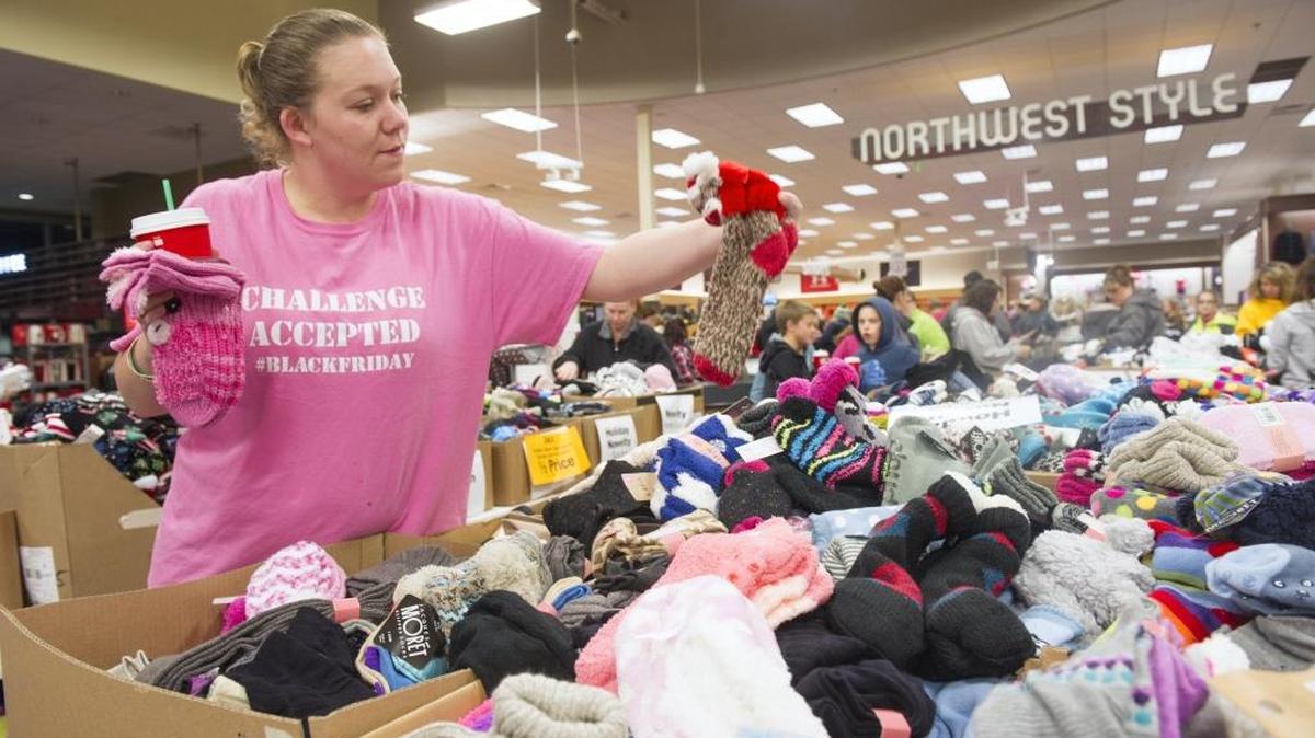 Keala Chapman of Ferndale shops for socks at the annual sock sale at the Bakerview Fred Meyer in Bellingham, Friday morning, Nov. 27, 2015. The two Bellingham Fred Meyer stores expected to sell 25,000 pairs of socks during the annual sale, which started in 1978.