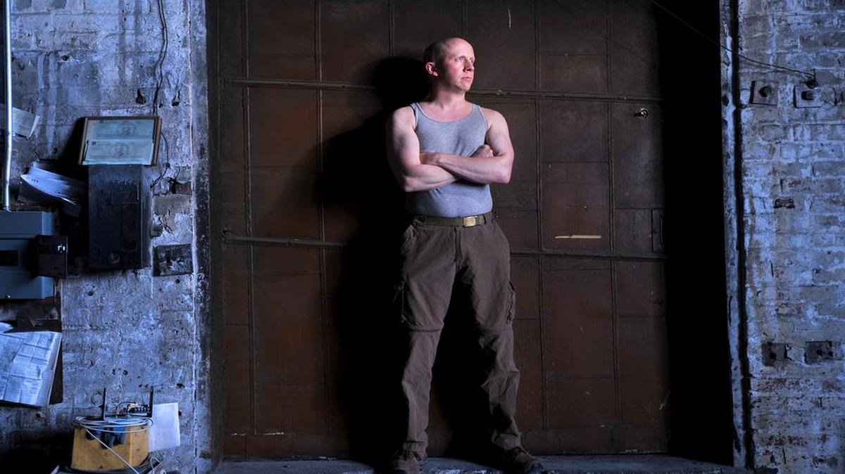 
Writer and Ferndale teacher Rob Slater decided to shave his head after his alopecia left a bald patch above his forehead. In 2013, Slater posed for this picture to accompany his chapter in a serial science fiction story that ran in The Bellingham Herald.
