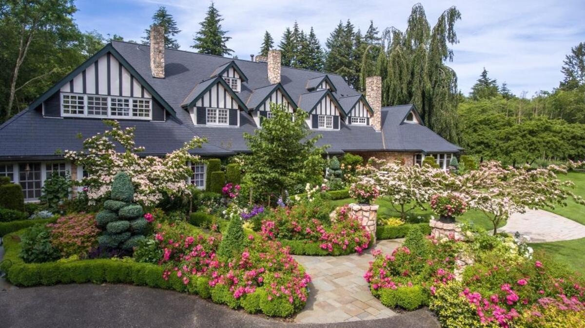 The gardens of the Bachman estate – just south of the border between Blaine and Guide Meridian – are “immaculate,” says one of the listing agents.