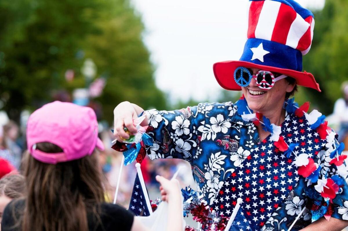 Maggie Breckenridge of Blaine hands out candy during the Old Fashioned 4th of July parade in Downtown Blaine in 2014.