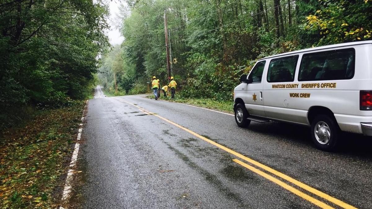 
A Whatcom County Sheriff’s Office work crew of people serving time for crimes cleans up damage after the Saturday, Aug. 29, storm.
