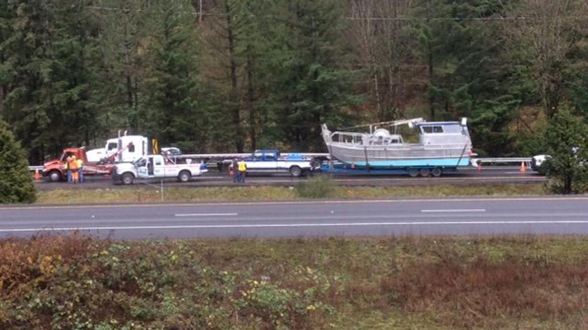 A Ford F350 towing a 34-foot long commercial boat – 50 feet long with trailer attached – jackknifed on northbound Interstate 5 near Lake Samish Monday.