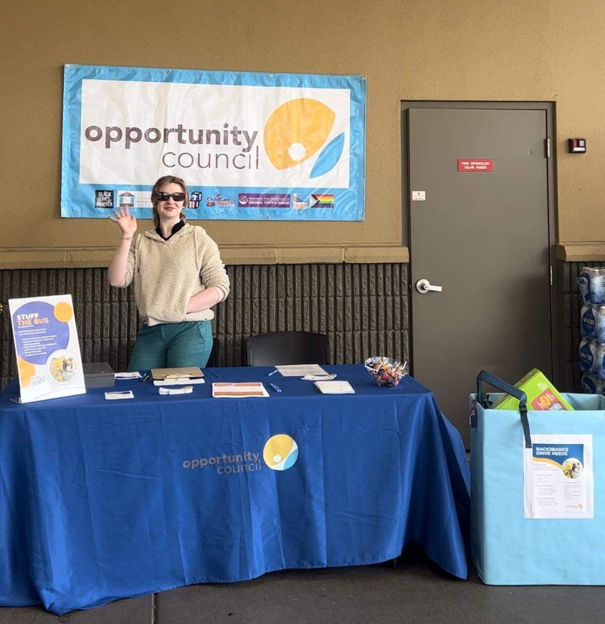 An Opportunity Council staffer collects donations and answers questions during a previous Back2Basics event.