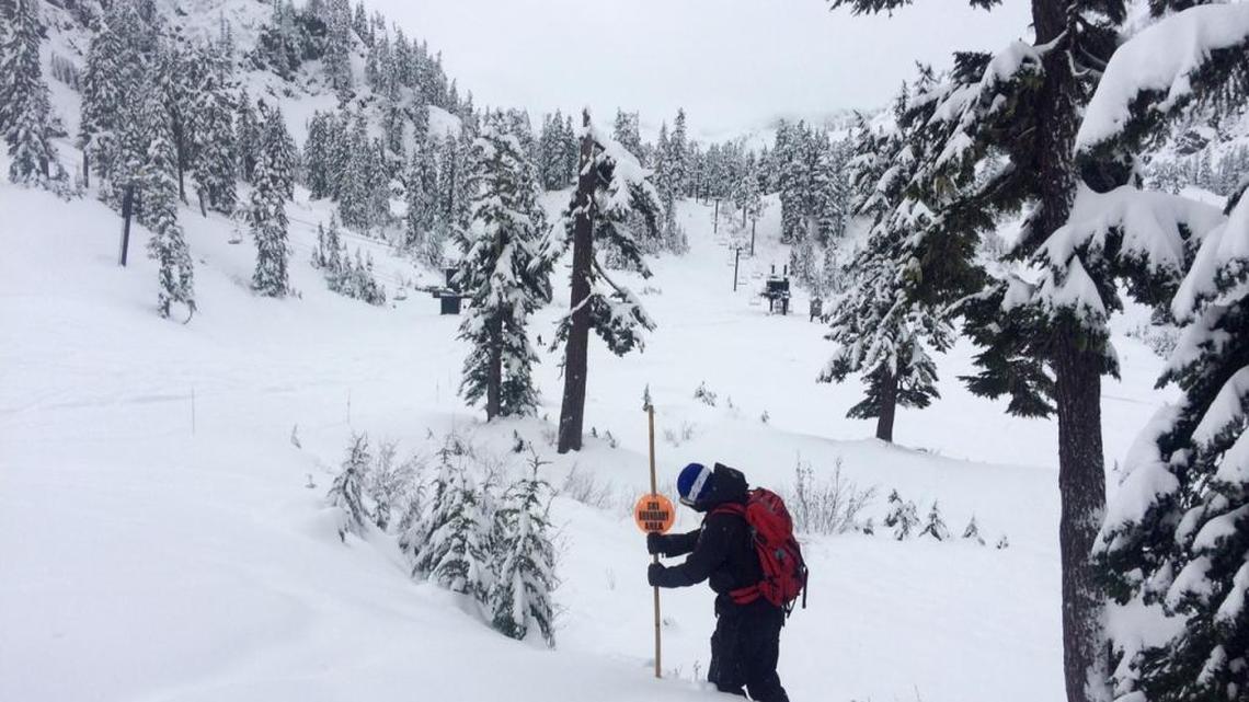 Patrol Director Sam Llobett installs rope lines at Mt. Baker Ski Area on Monday, Nov. 16, 2015. The ski area plans to open for the season Thursday, Nov. 19.
