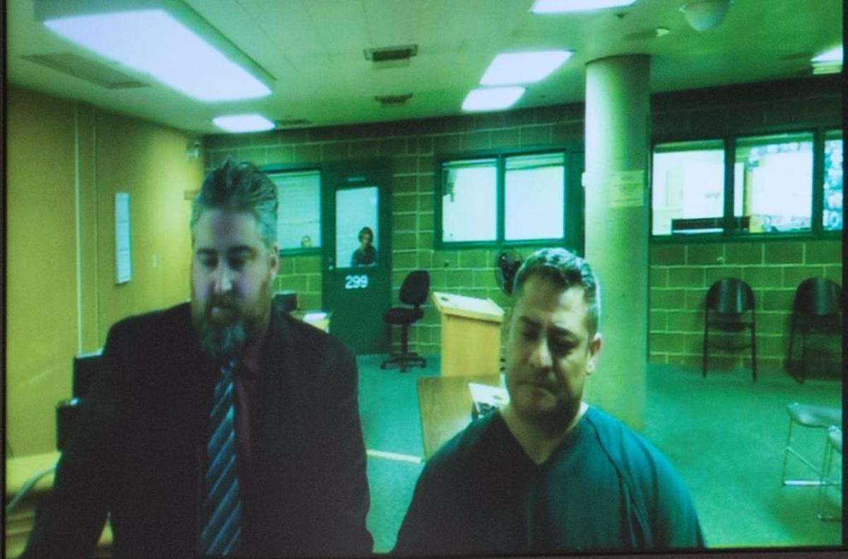 Carlos Scott, right, makes his first appearance or rape charges in Whatcom County Superior Court  Dec. 5. Now he is facing allegations that he repeatedly raped another inmate while in the Whatcom County Jail, according to charging documents read Thursday in Whatcom County Superior Court.