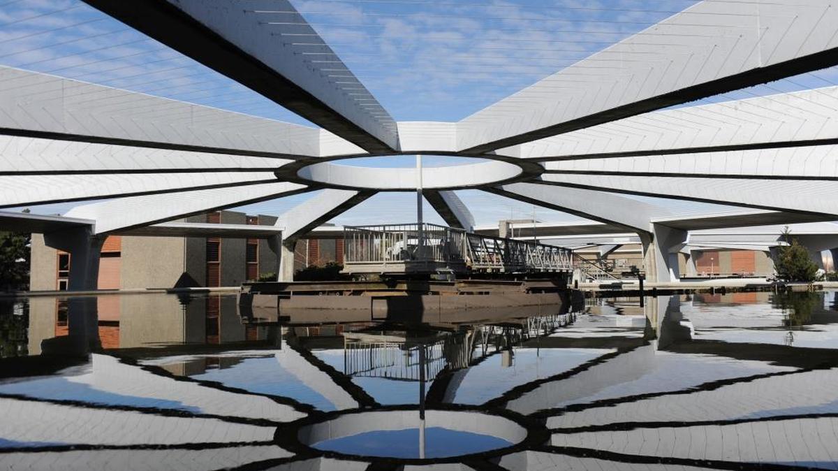 The arches of the secondary clarifier are reflected in the wastewater being treated at the Post Point Wastewater Treatment plant in 2010.