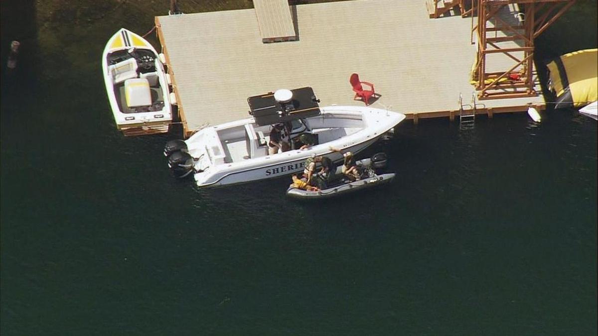 A Whatcom County Sheriff's team searches for a missing 18-year-old from China at Camp Firwood on Wednesday, July 26, 2017. The teen’s body was found in 30 feet of water later that day.