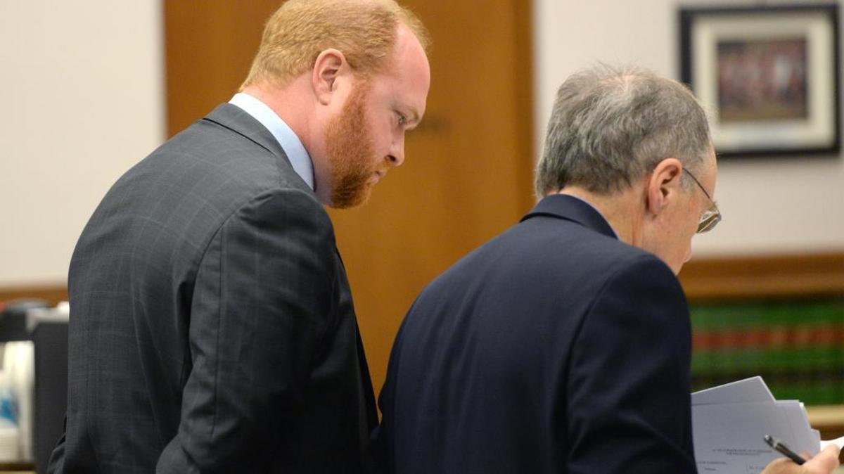 Tyler Ryan, left, pleads not guilty to child rape at his arraignment with his attorney, David Allen, in Whatcom Superior Court in Bellingham Friday, July 21, 2017.