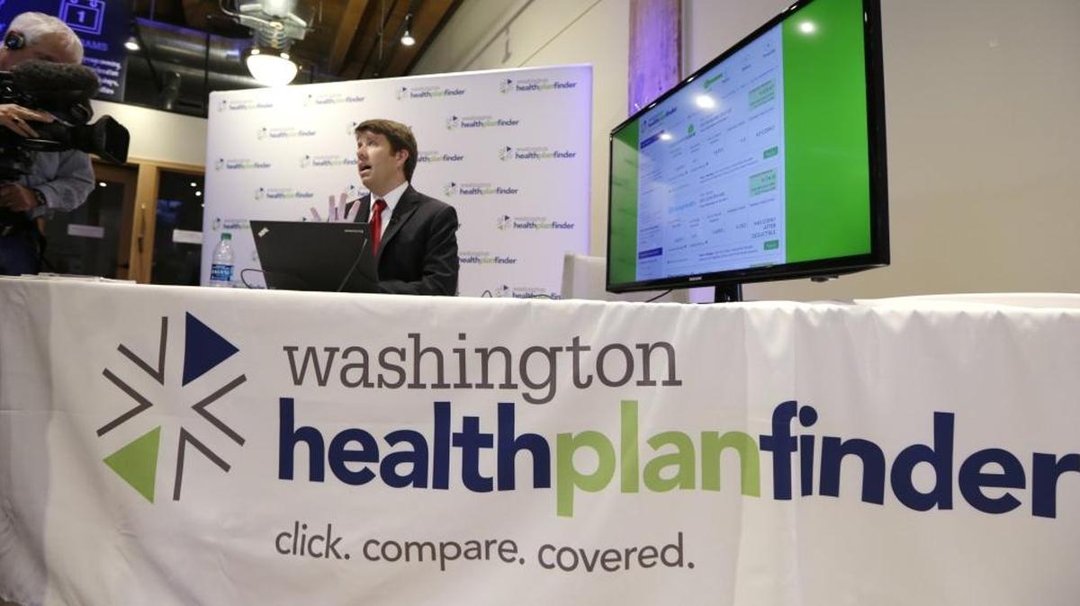 Brad Finnegan demonstrates the Washington Healthplanfinder website. Washington was among the states to set up its own exchange, where people who don’t have insurance through their employers can buy a plan.