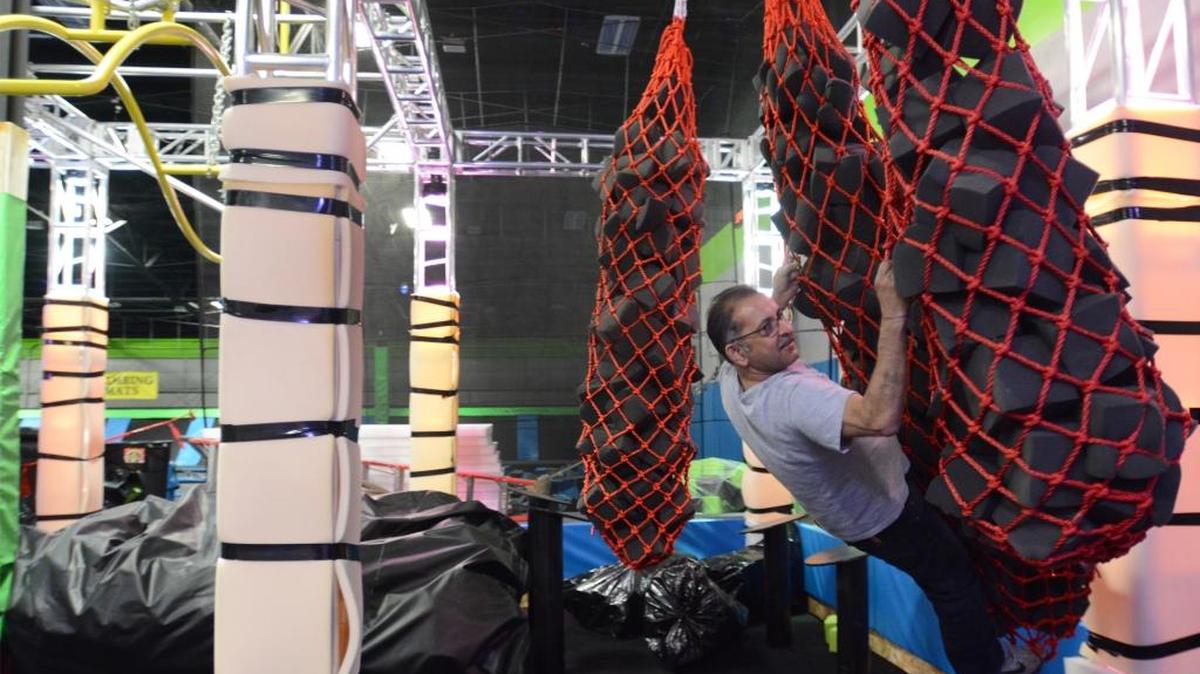 Trampoline Zone owner Rajiv Malhan shows off the new "Ninja" obstacle course at the Bellingham store Tuesday, Dec. 5, 2017.