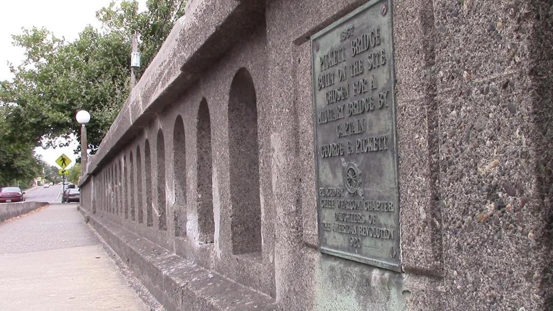 City of Bellingham officials removed signs identifying Pickett Bridge at Prospect and Dupont streets, as well as directional signs leading to The Pickett House, Friday, Aug. 18, 2017.