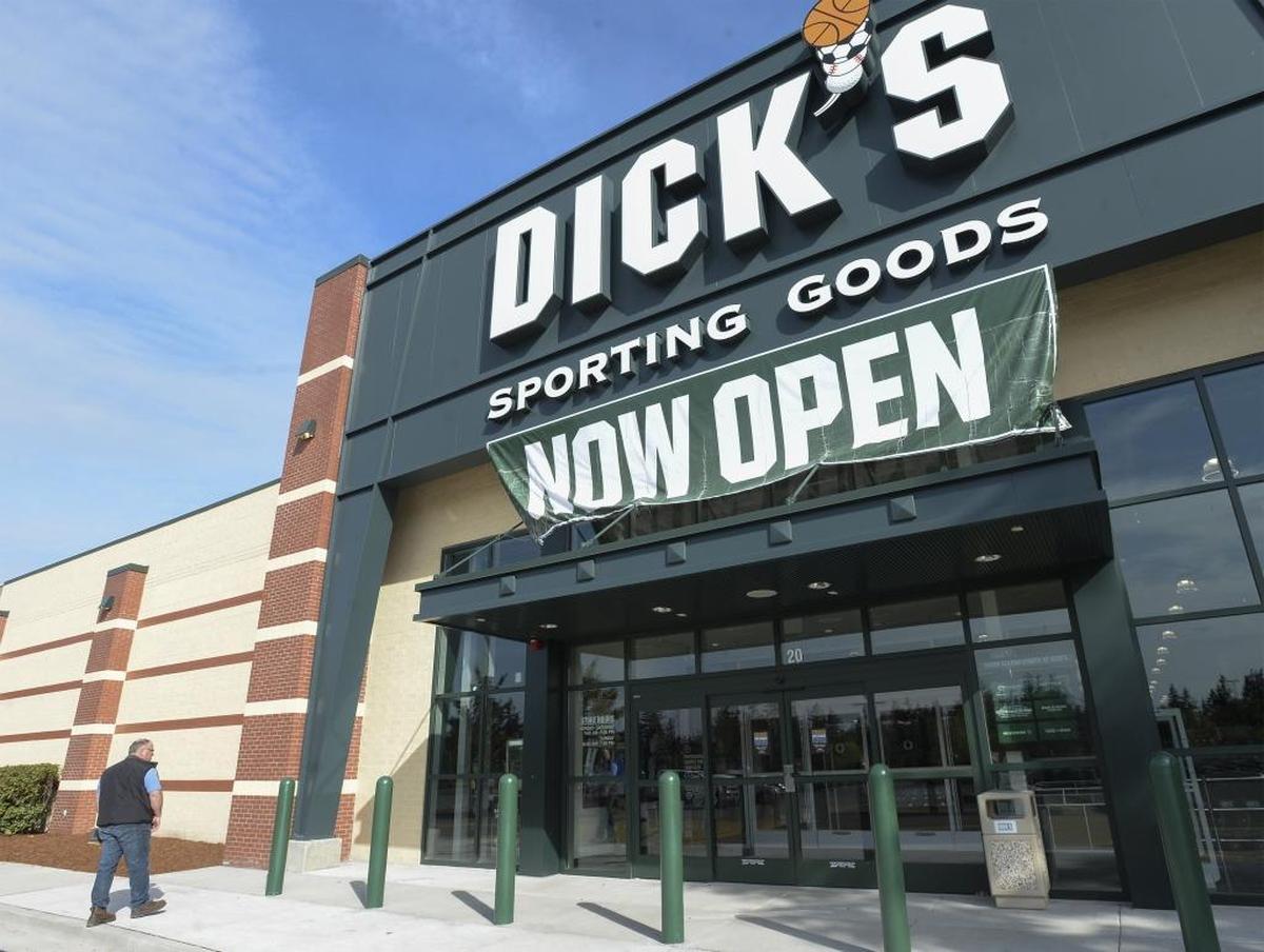Seth Jeretzky waits outside the Dick's Sporting Goods store to open for the first time at Bellis Fair Wednesday morning, May 10, 2017.