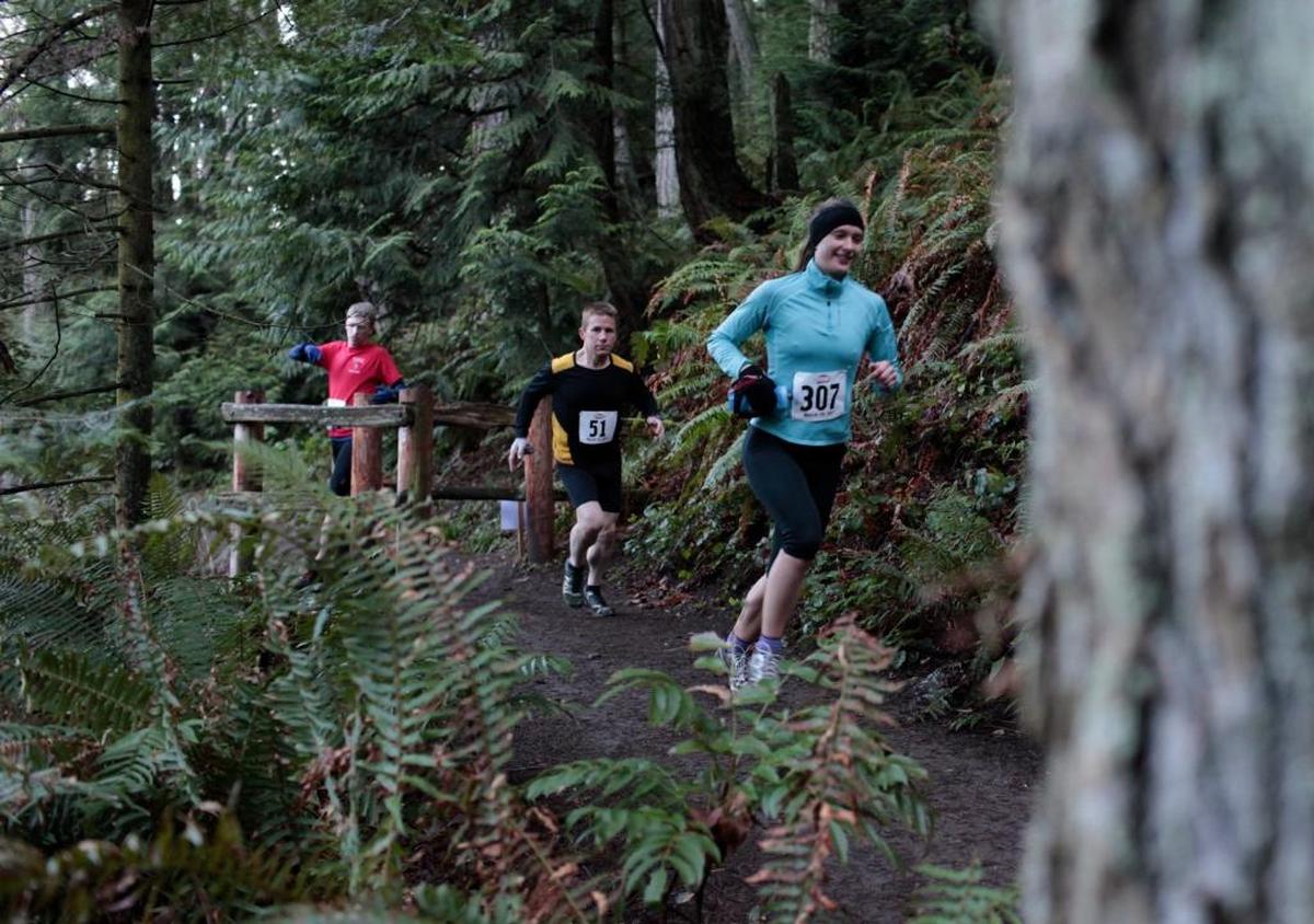Trail runners traverse trails in the Chuckanut Mountains around Fragrance Lake in 2011.