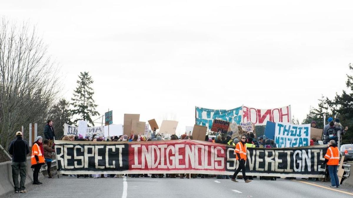 Protesters block northbound Interstate 5 at Lakeway Drive in protest of the Dakota Access Pipeline on Saturday, Feb. 11, in Bellingham.