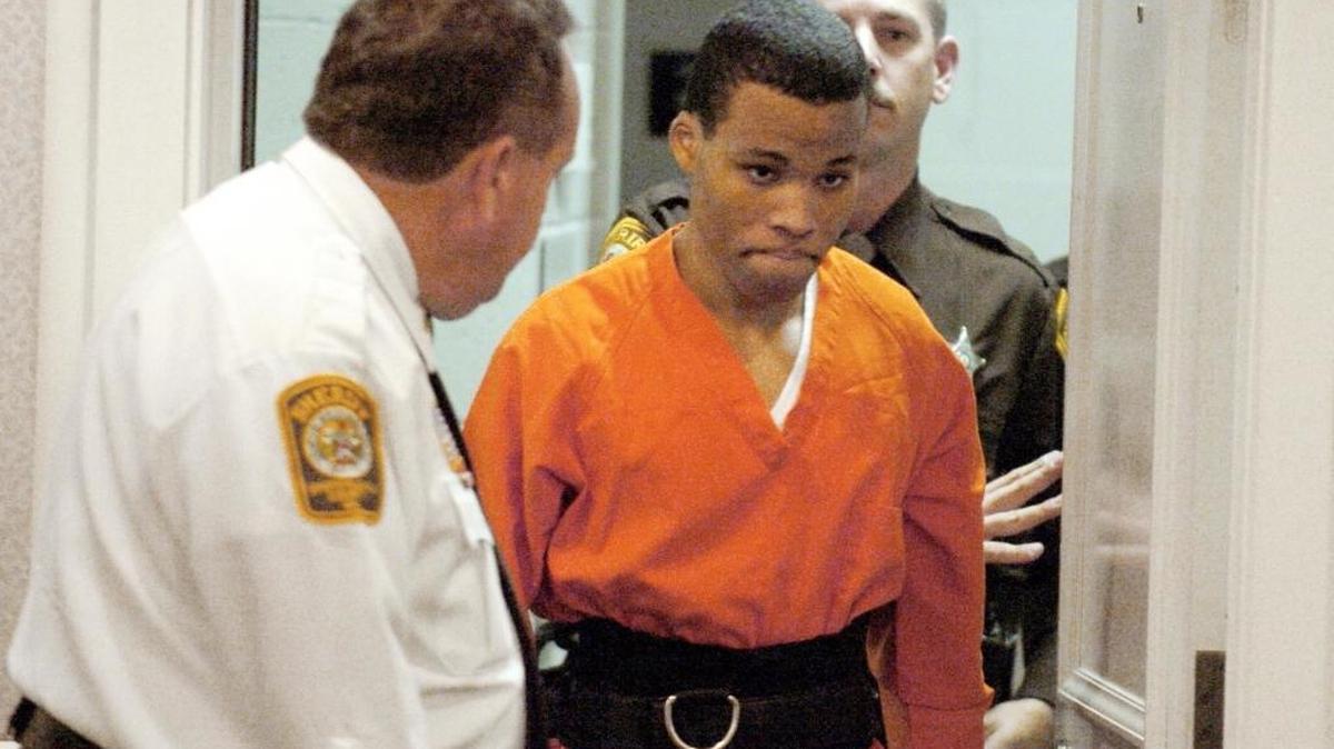 FILE - In this Oct. 26, 2004, file photo, Lee Boyd Malvo enters a courtroom in the Spotsylvania, Va., Circuit Court. Malvo’s lawyer said Tuesday Malvo is entitled to a new hearing to ask for a lighter sentence, under a U.S. Supreme Court ruling that found mandatory life-without-parole sentences for juveniles unconstitutional. Malvo was 17 when he was arrested in a series of random shootings that killed 10 people and wounded three in Virginia, Maryland and the District of Columbia in 2002.