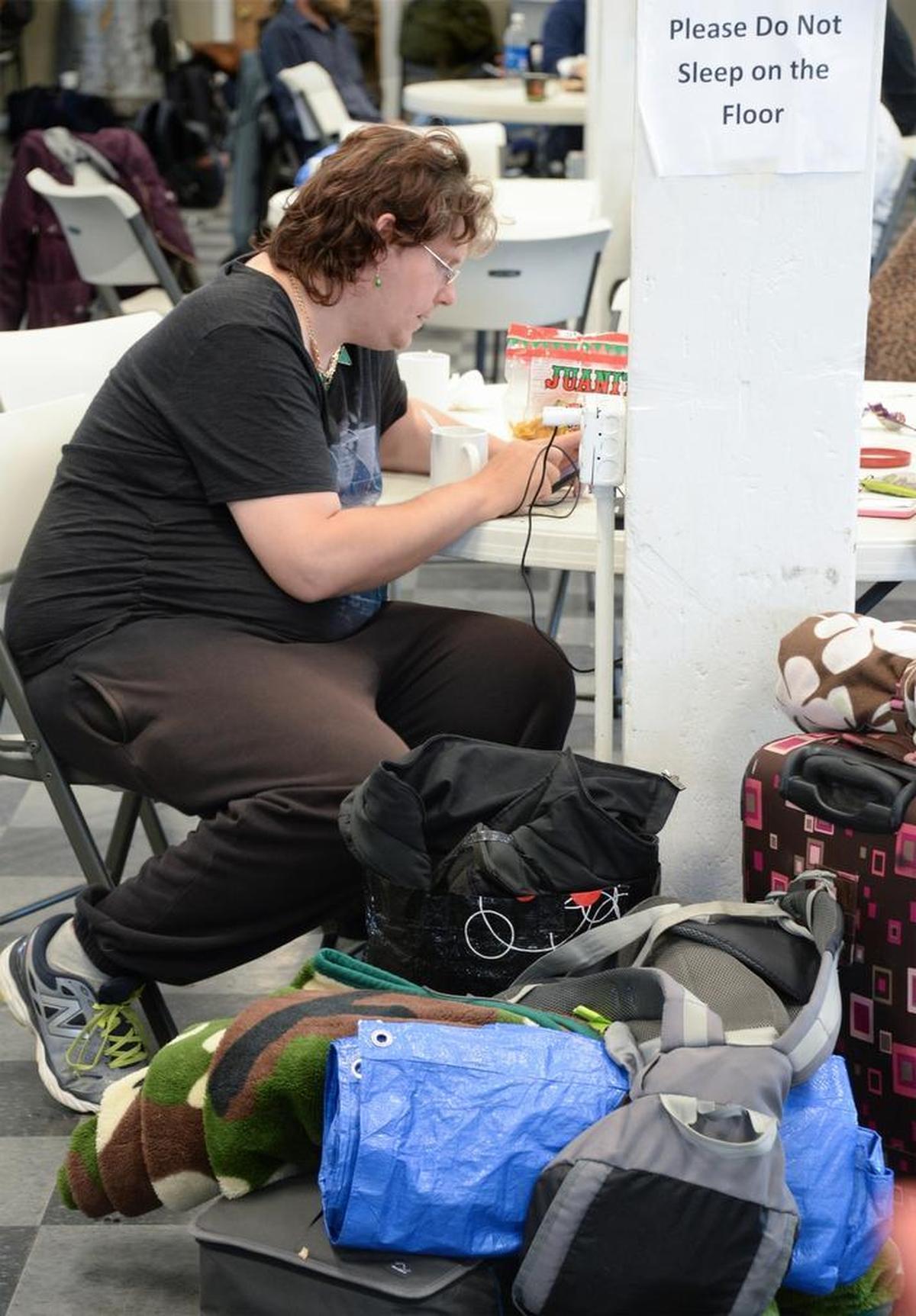 Jade Griffin takes a break at the Lighthouse Mission Ministries’ Drop-In Center in Bellingham on May 31, 2017.