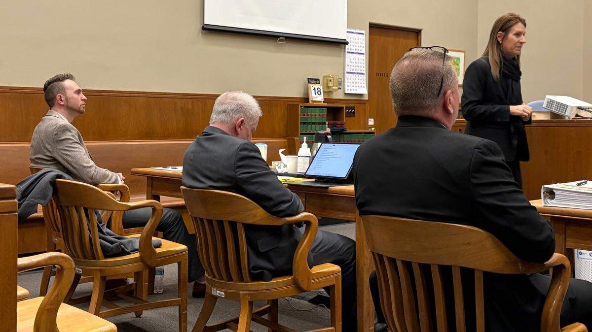 Alexander Vanags, left, listened to attorney Jennifer Cannon-Unione present an opening argument in his defense. Vanags is on trial for second-degree murder.