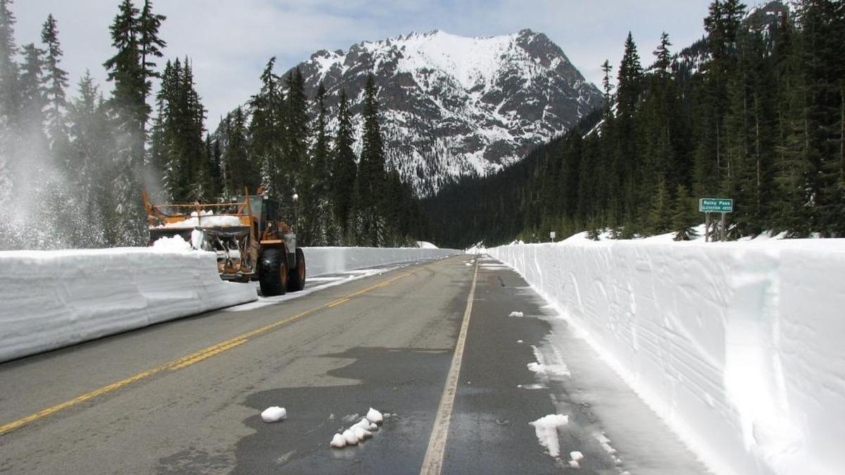 Crews clear the west end of the North Cascades Highway, also known as Highway 20, near Rainy Pass in this undated photo.
