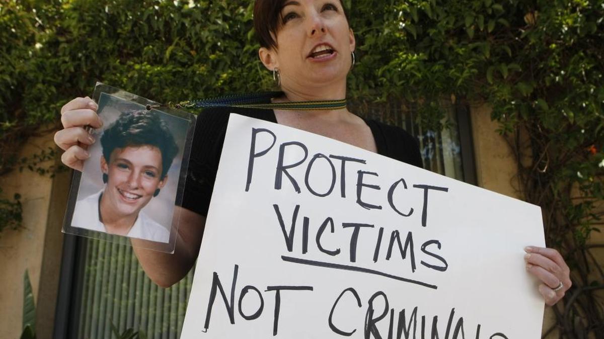Joelle Casteix, the Southwest Regional Director of Survivors Network of Those Abused by Priests, protests clergy sex abuse outside Our Lady of the Angels Cathedral on April 28, 2010, in Los Angeles. The “secret file” on a priest who served in the Pacific Northwest, including in Bellingham, showed he was moved from parish to parish despite reports of him being a pedophile.