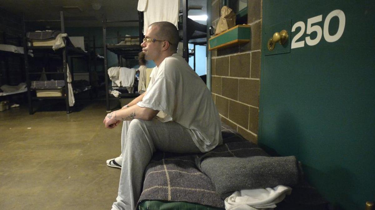 Inmate Chris Mayse watches TV after getting off the night shift as a trustee at the Whatcom County Jail on March 26, 2015. A ballot measure to increase the sales tax to raise money for a new jail was trailing in the Nov. 3 election.