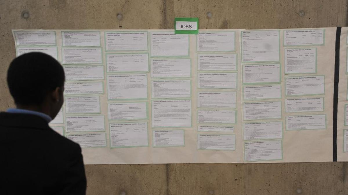 A Western Washington University student looks at the job board at the 2011 Winter Career Fair. The 2016 fair, which is open to the public, is 11 a.m. to 3 p.m. Thursday, Feb. 11, at Viking Union Multi Purpose Room on campus.