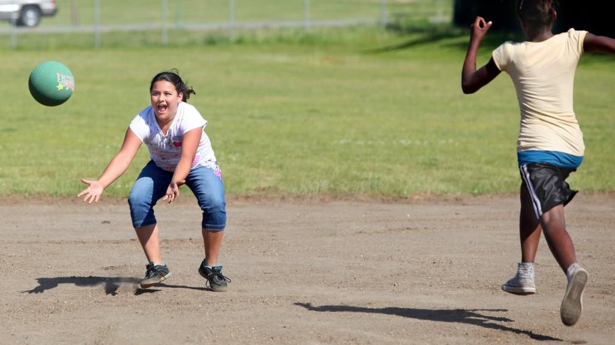 Girls play kickball at Kendall Elementary School in 2009.