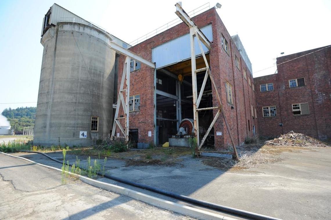 Chipping bins and the bark and chipper building at the old Georgia Pacific waterfront, in Bellingham, Aug. 13, 2015. The building is scheduled for demolition by January 2016.