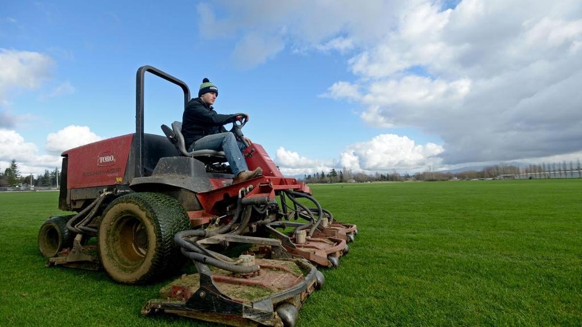 Daniel Anderson mows the grass at the Northwest Soccer Park north of Bellingham Monday, Feb. 22, 2016, in preparation for the beginning of the spring soccer season. The name of the park is being changed to Phillips 66 Soccer Park after a major donation from the Whatcom County refinery.
