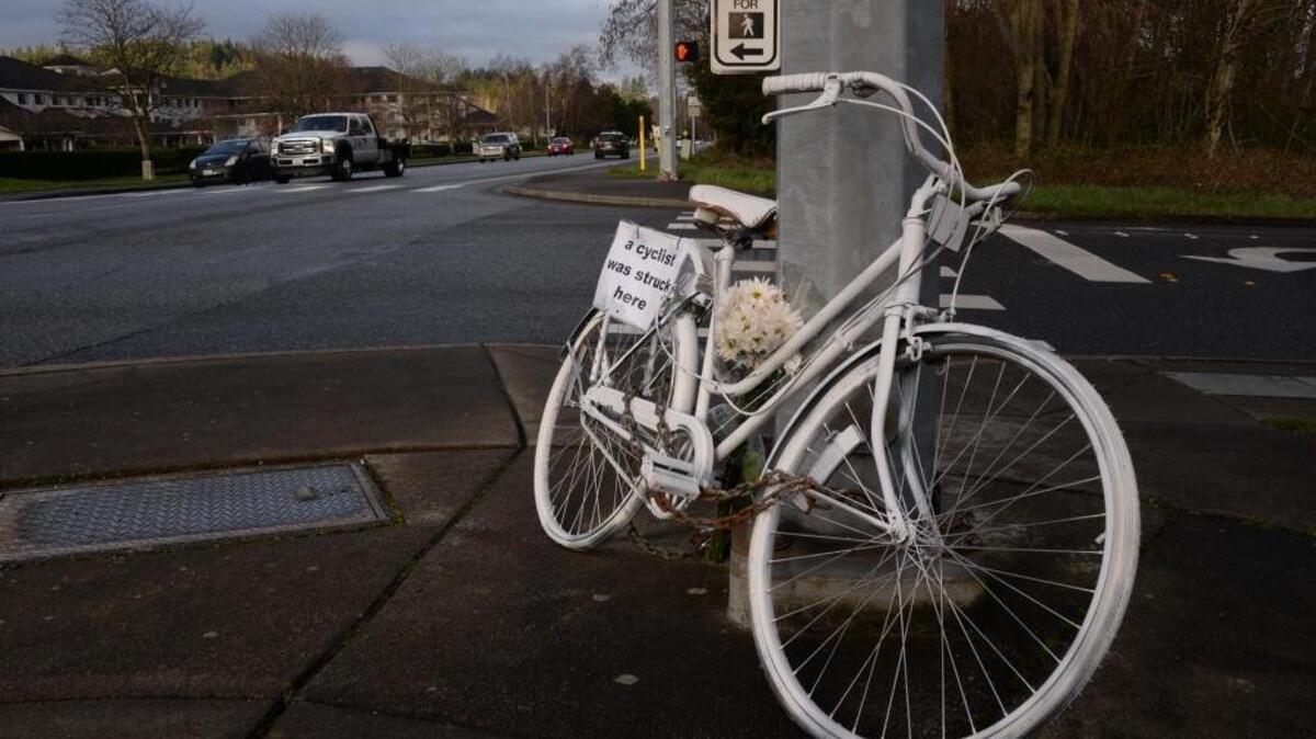 A "Ghost Bike" is chained to a utility pole at the intersection of Old Fairhaven Parkway, March 27, 2017, for bicyclist Eric Michael Weight, who died after colliding with a pickup.