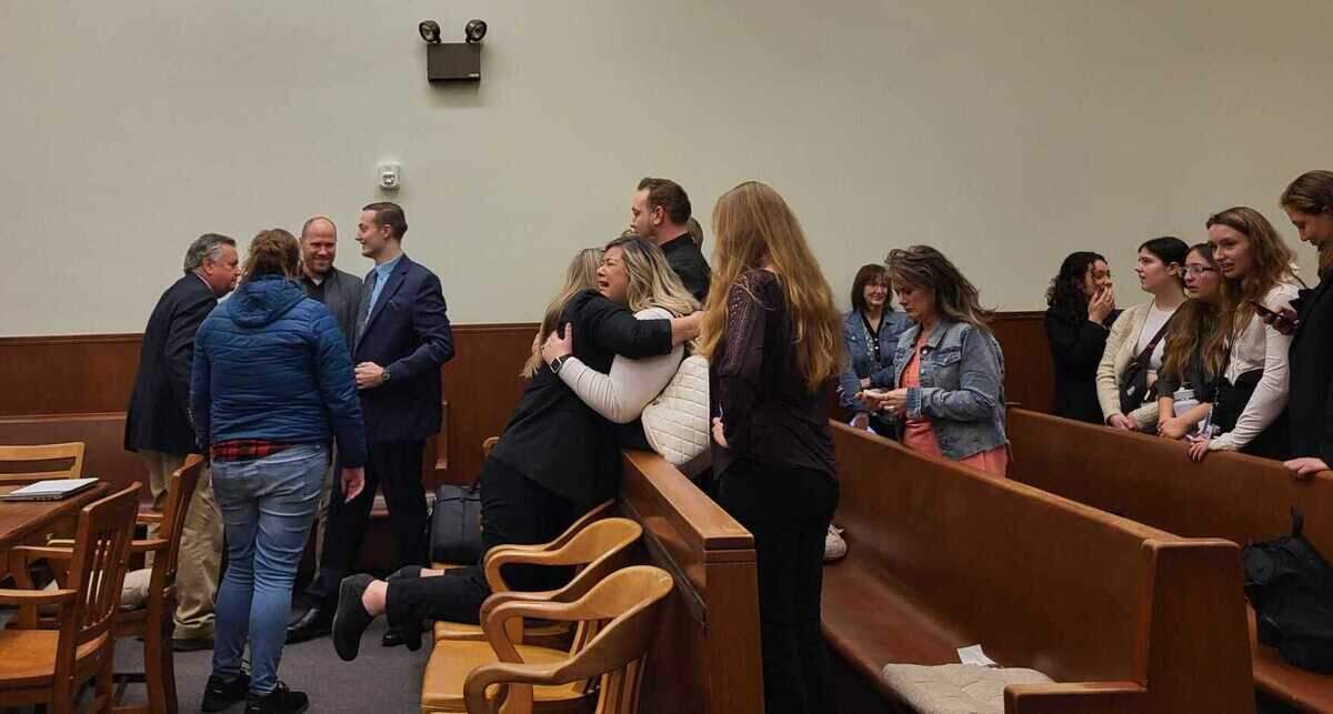 Ethan Knight, the Whatcom County man accused of shooting and killing his father in 2022, was found not guilty of first-degree murder or second-degree murder in Whatcom County Superior Court on March 15, 2024. Knight, along with his supporters and defense attorneys, is seen in the courtroom after the not-guilty verdicts were announced.