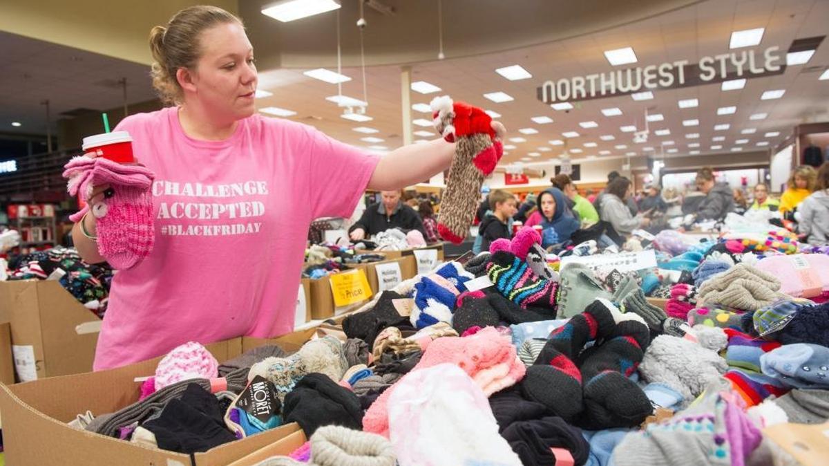 Keala Chapman of Ferndale shops for socks at the annual sock sale at the Bakerview Fred Meyer in Bellingham on Friday morning, Nov. 27, 2015. The two Fred Meyer stores in Bellingham expected to sell 25,000 pairs of socks during the annual sale.