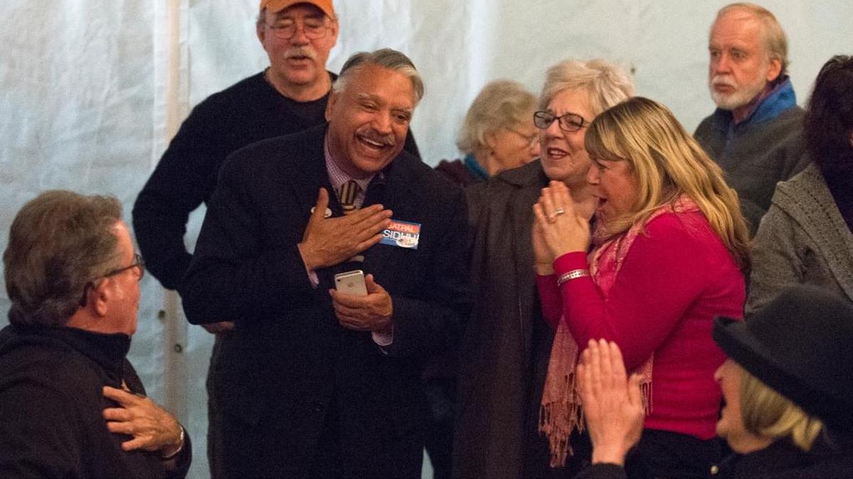 Whatcom County Council District 2 candidate Satpal Sidhu reacts to early election results on Tuesday, Nov. 3, at Chuckanut Brewery in Bellingham, Wash. He and his opponent, Kathy Kershner, were neck and neck to win the seat Tuesday and remained so Wednesday, with more votes to be counted Thursday.