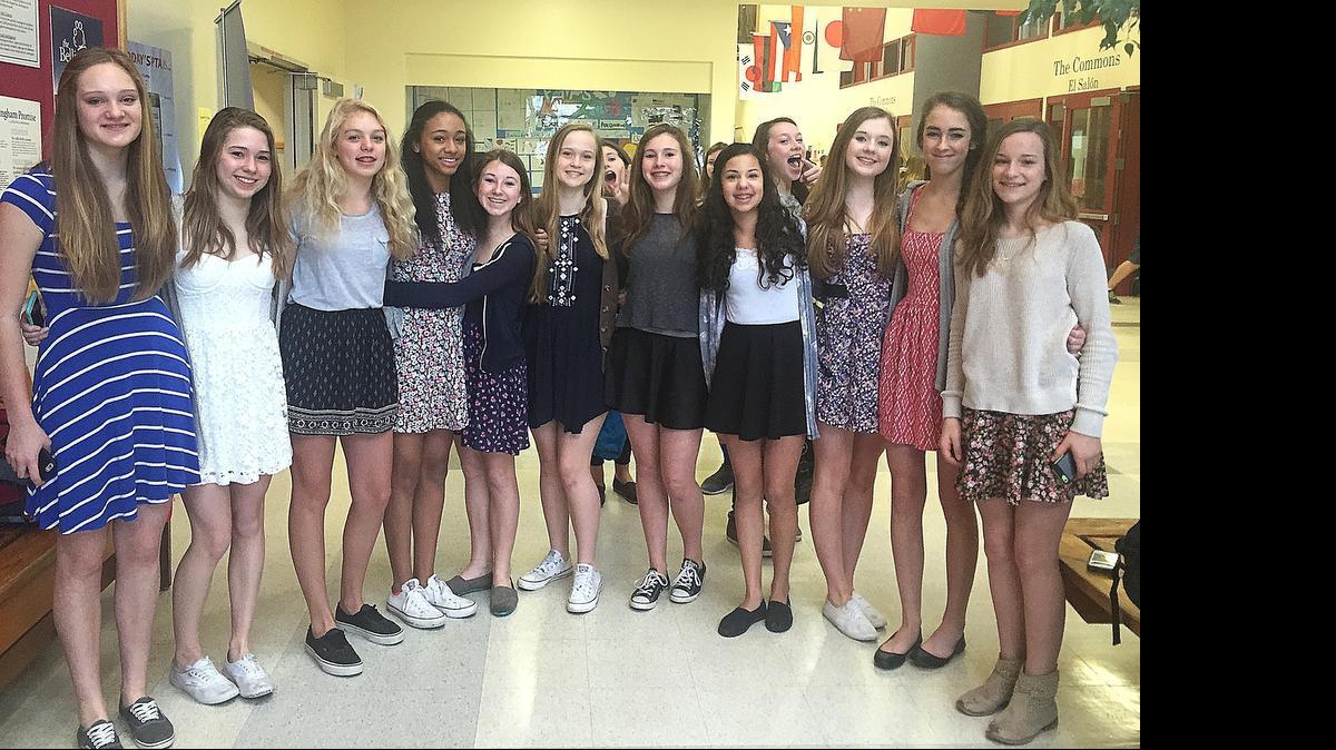 
A group of Fairhaven Middle School girls pose March 25 in the dresses they wore to honor their friend who was moving away. Many of the girls were asked by school officials to change clothes after being told their outfits were a distraction and violated the dress code. The dress code has been changed for fall 2015 to be less restrictive and gender neutral.
