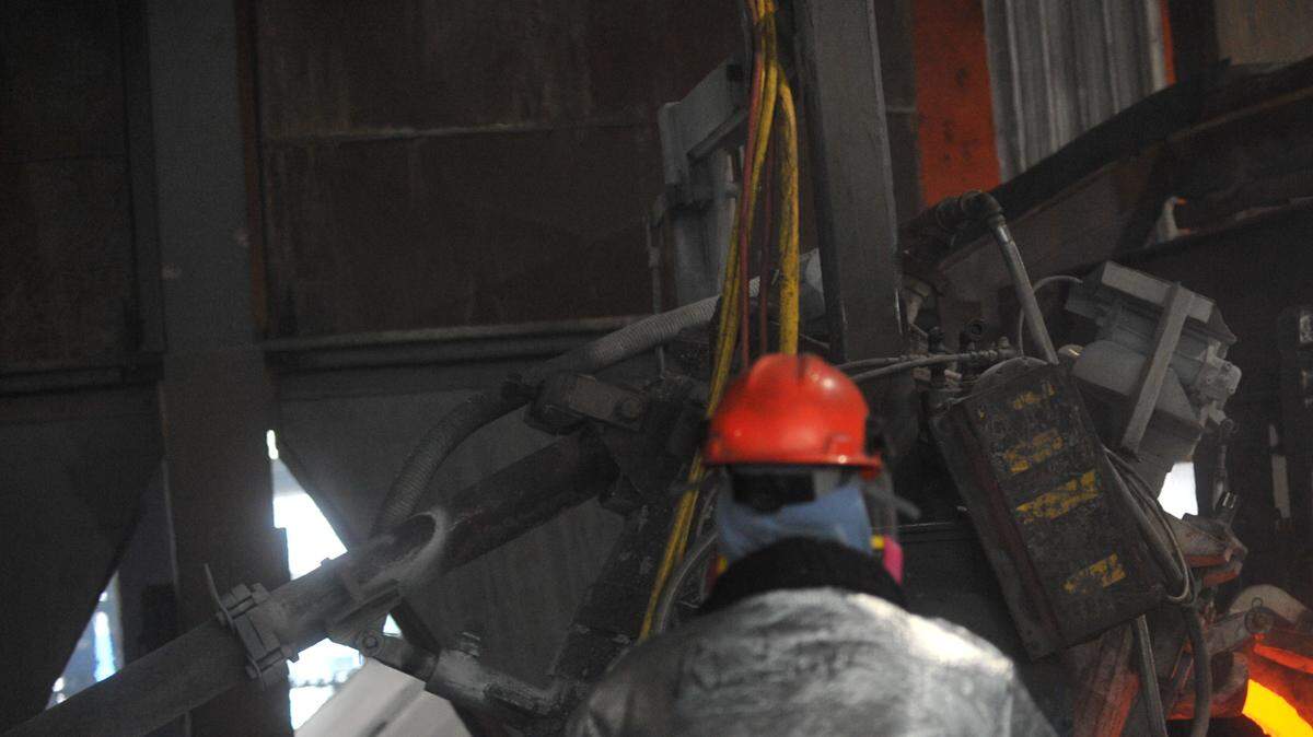 Workers start aluminum smelter pots on potline B at the Alcoa Intalco aluminum smelter west of Ferndale on Feb. 15, 2011. The state Department of Ecology has proposed capping greenhouse gases from the state’s 35 largest emitters, including Intalco.