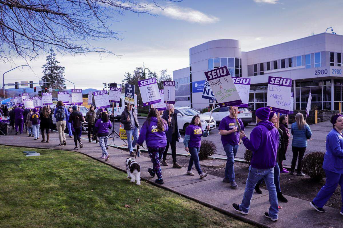 SEIU members participate in an informational picket at PeaceHealth St. Joseph Medical Center in Bellingham.