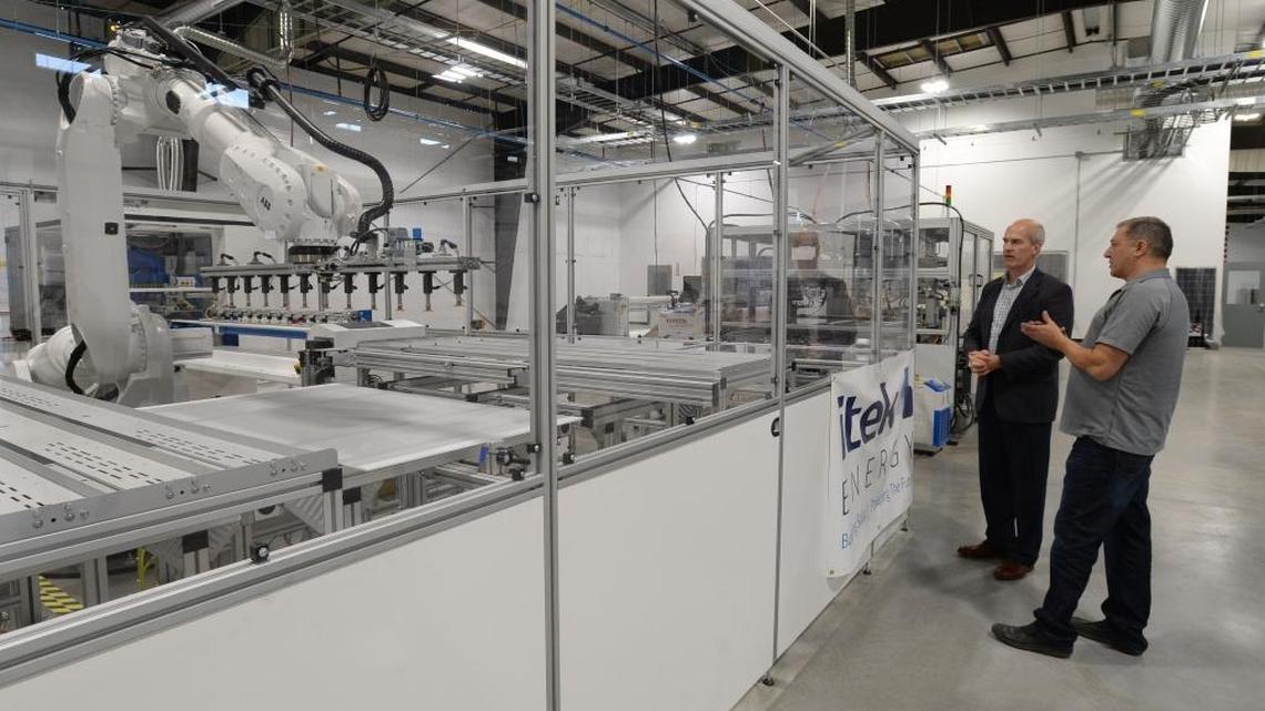 U.S. Rep. Rick Larsen tours Itek Energy’s new solar panel manufacturing facility on Cornwall Avenue with Chief Operating Officer Dave McCarty in Bellingham Friday, Oct. 6, 2017. At 48,000 square feet, the new facility is three times as big as Itek’s other facility.