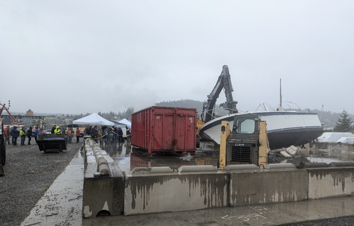 A derelict boat sits at the Port of Bellingham on Wednesday, prior to being recycled. The state’s Vessel Turn-in Program allows people without the financial means to properly dispose of unused boats to recycle them free of charge.