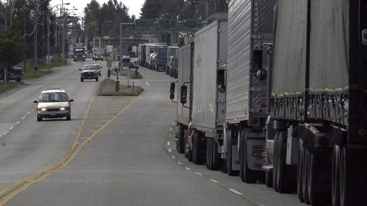 Trucks back up waiting to cross into the United States at the Pacific Highway crossing in Blaine in 2017. The United States is spending more than $200 million on improving and expanding it and two other Whatcom County border crossings.