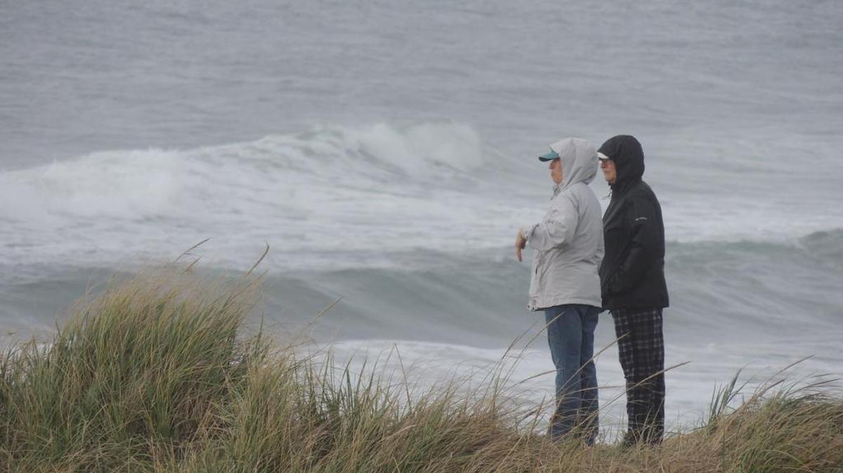 A bluff above the beach near Westport, Wash., makes a good, but windy spot, to watch storm-driven waves crash ashore.
