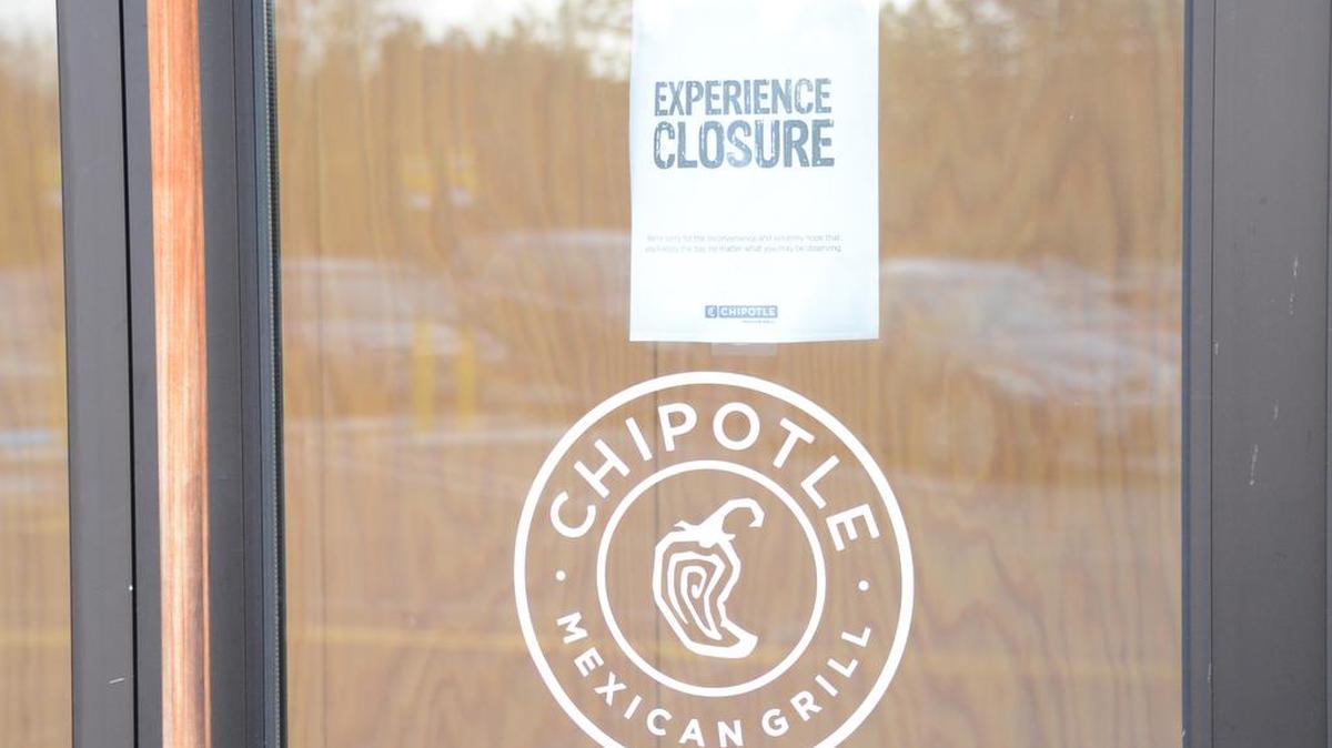 A sign on the front of the Bellingham Chipotle announcing that the restaurant was closed on Monday, Nov. 2, 2015. The eatery was among 43 Chipotle restaurants in Washington state and Oregon that closed as health officials investigate an E. coli outbreak.