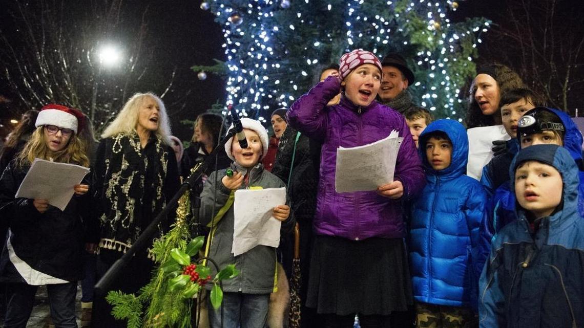 Children and adults from Wild Hare Music School sing Christmas carols during the Bellingham Tree Lighting Ceremony on Dec. 3 at Depot Market Square.