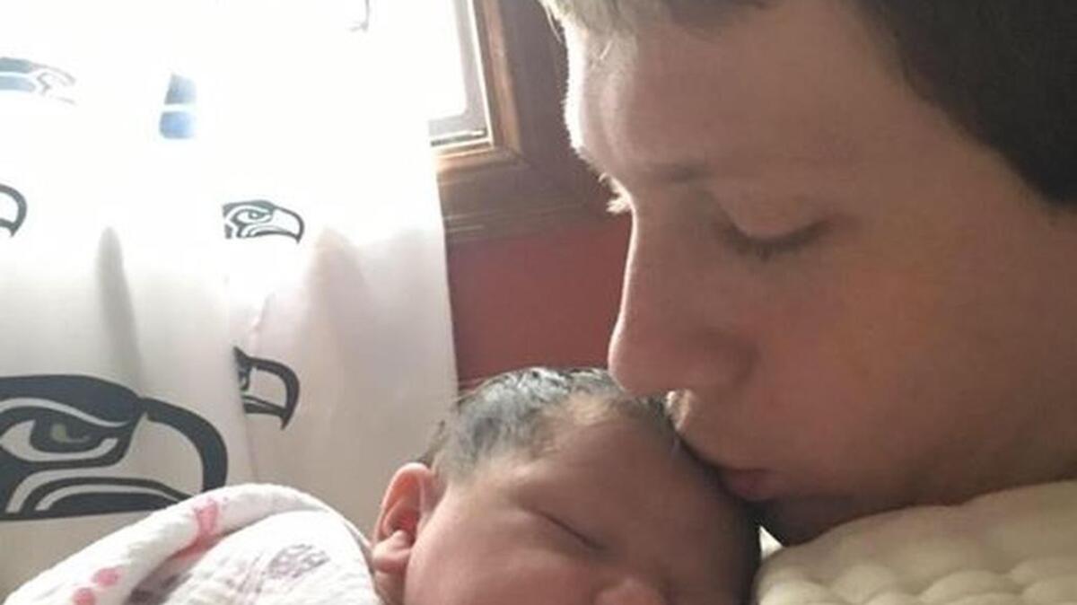 Phil Moyer nuzzles his newborn daughter Penelope Moyer in a photo from Phil’s Facebook page. Both were killed in a Mother’s Day wreck that injured Pamela Moyer, Phil’s wife and Penelope’s mother.