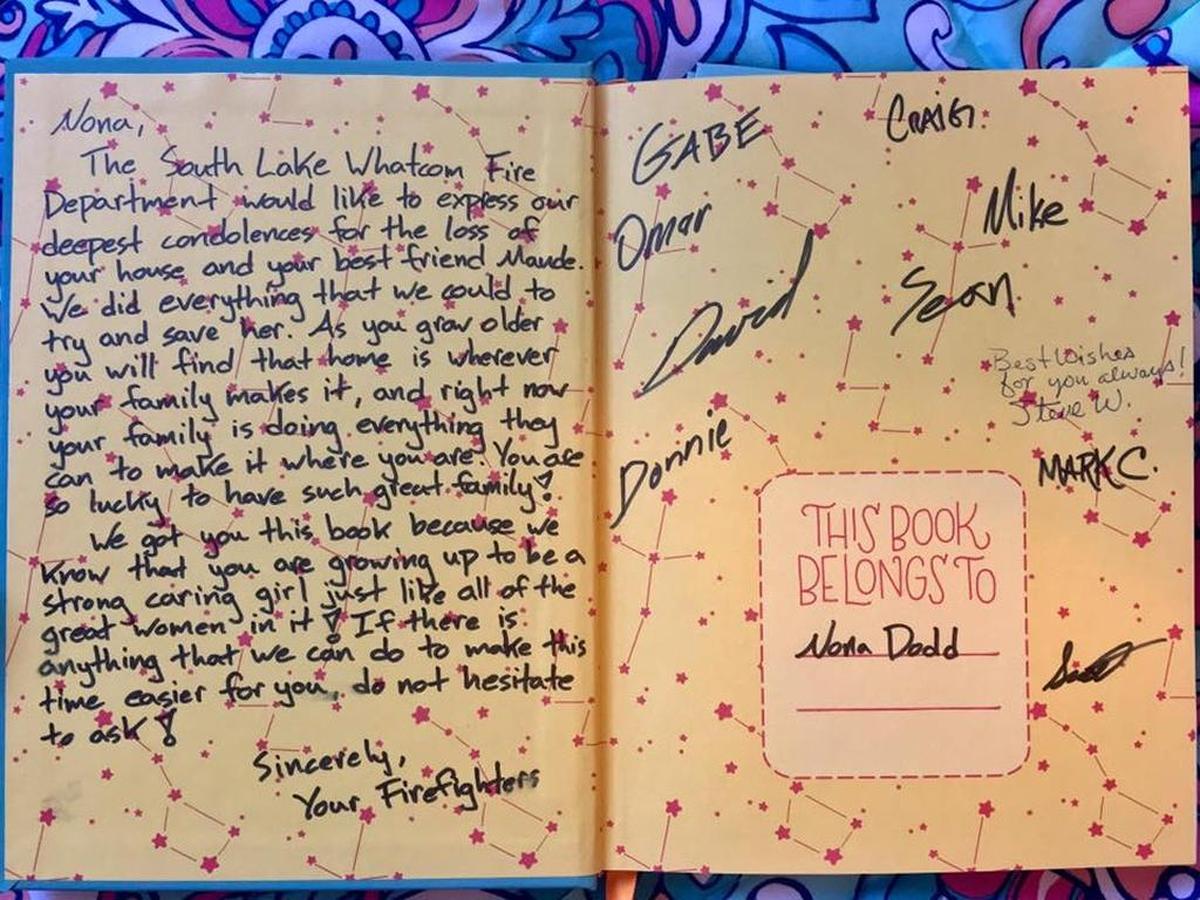 Firefighters wrote encouraging messages to Nona in a book they brought for her last week.