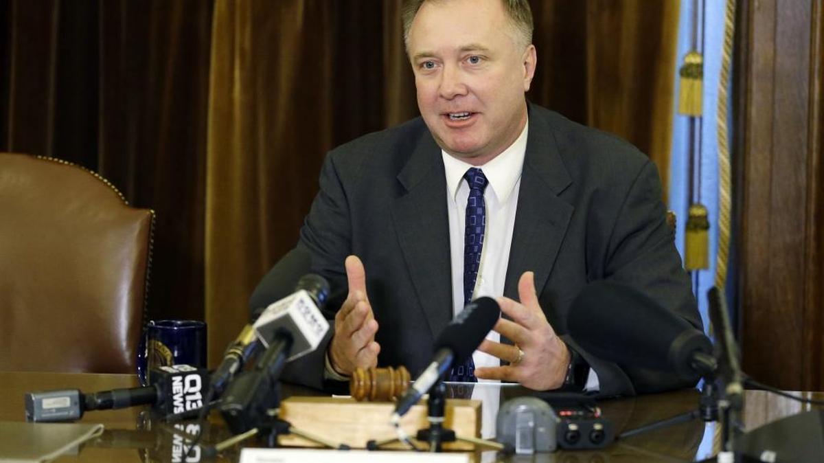 State Sen. Doug Ericksen, R-Ferndale, talks to reporters Feb. 2 at the state Capitol in Olympia. Ericksen, who is serving as a state senator and a member of President Donald Trump’s transition team, said the Republican majority in the state Senate can rely on him, and that he’s able to do both jobs.