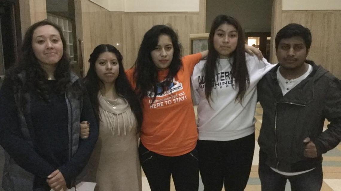 Students from the Western Washington University Blue Group, a club for undocumented immigrants and allies, pose for a photo after speaking at Bellingham City Council Monday, Nov. 14, 2016, to ask the council declare Bellingham a sanctuary city.