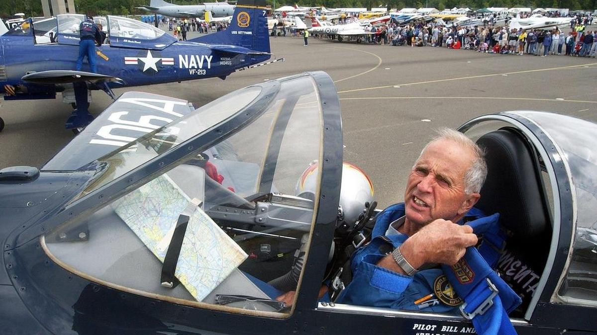 Bill Anders, a former Apollo 8 astronaut and president of the Heritage of Flight Museum, buckles in for a flight above the Bellingham International Airport during an air show in 2002.