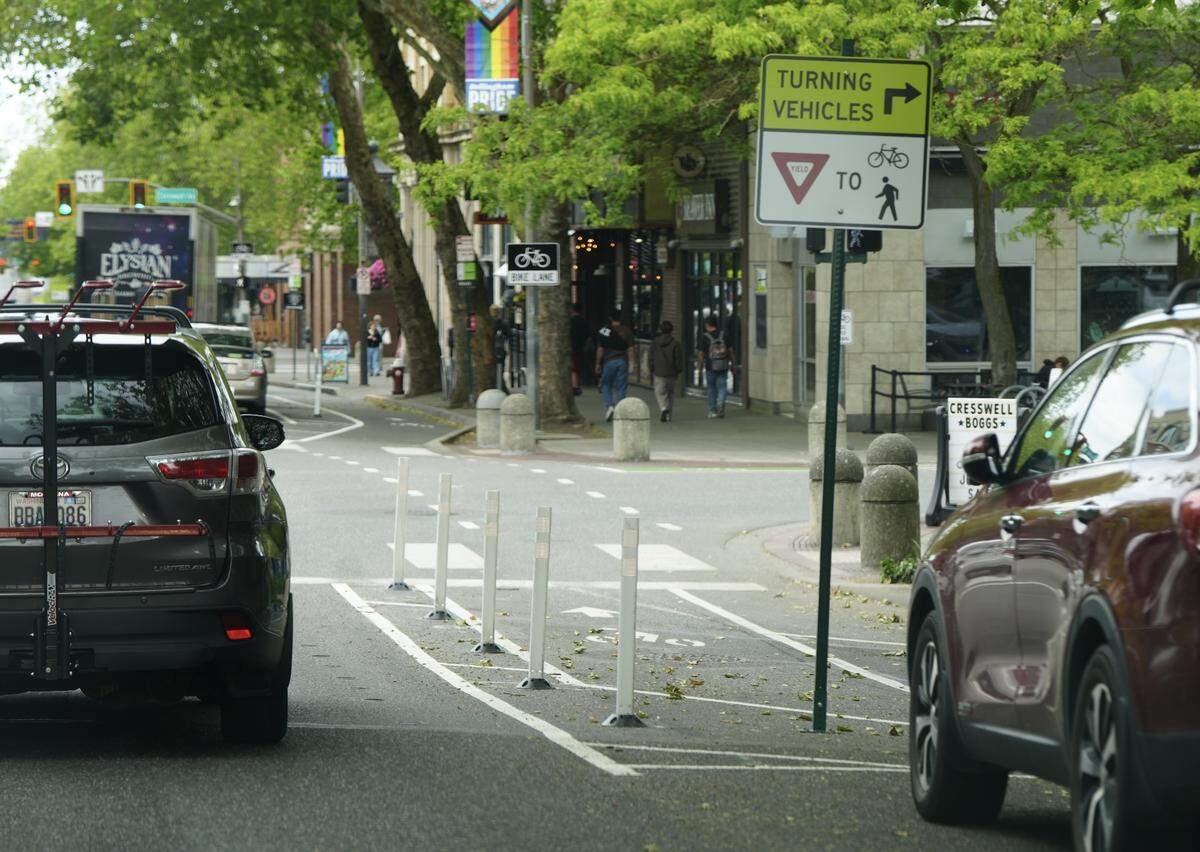 The city installed yield signs on Holly Street to help indicate the presence of cyclists and pedestrians to motorists in downtown Bellingham, Wash.